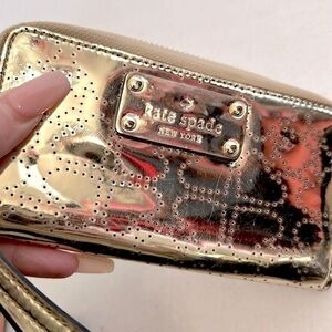 Kate Spade Jazzy Metro metallic gold Patent Perforated Wristlet Wallet